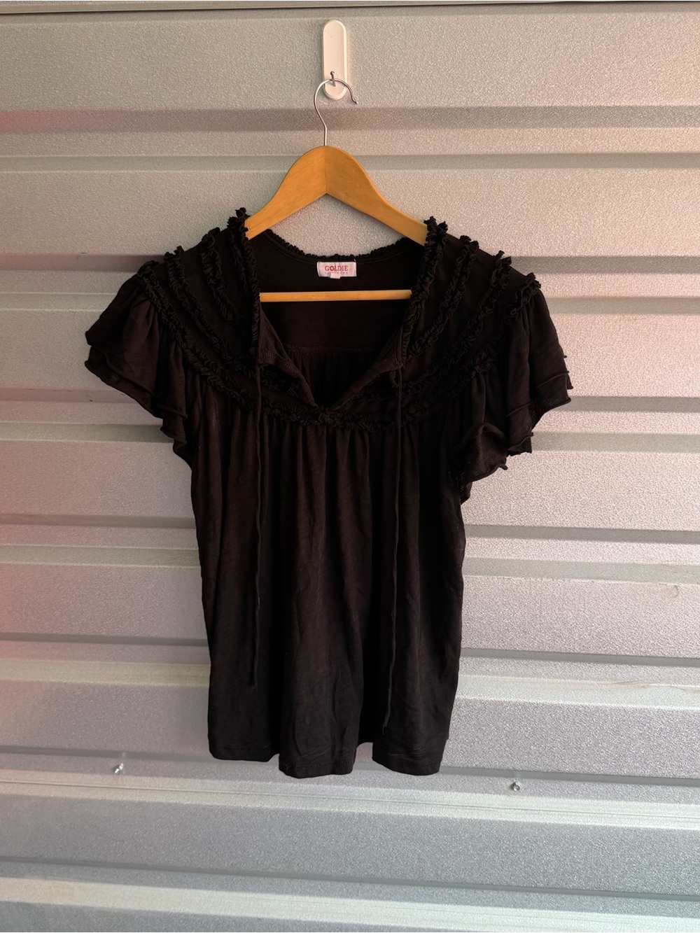 Goldie black flutter-sleeve blouse